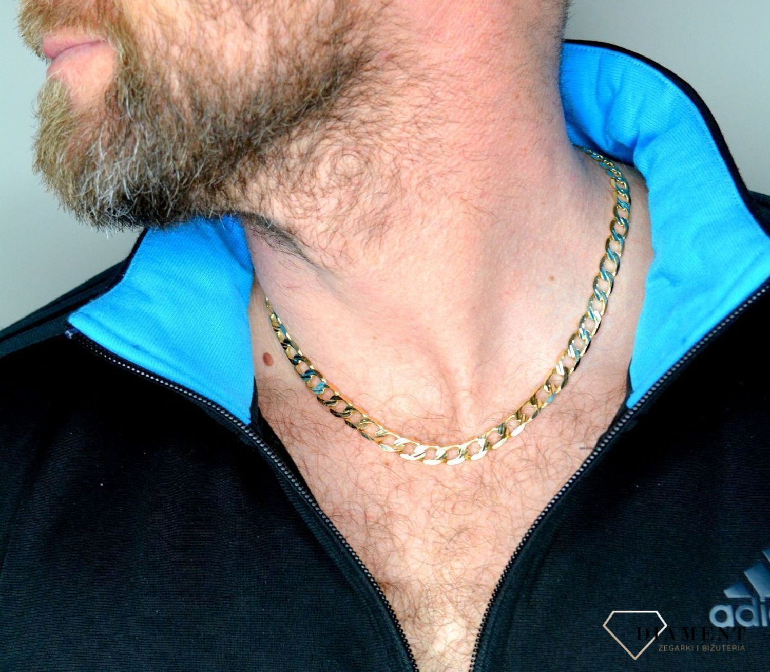 Złoty łańcuszek 585 pancerka 8 mm DIA-LAN-7859PAVE-585 8mm. Klasyczny i uniwersalny łańcuszek o splocie pancerki, wykonany z żółtego złota próby 585 o wadze około 34,33 gram. Łańcuszki to uniwersalne dodatki, które sprawdzają (1).jpg